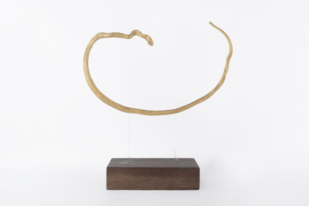 Time and Eternity (Uroboros), 2018, sand-cast brass, crystal rods, wooden base, 34 × 34 × 12 cm